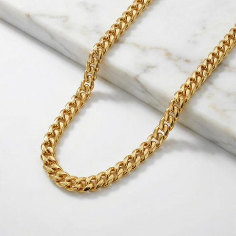 Men's Gold Miami Cuban Link Chain 6mm flat lay The Gold Gods