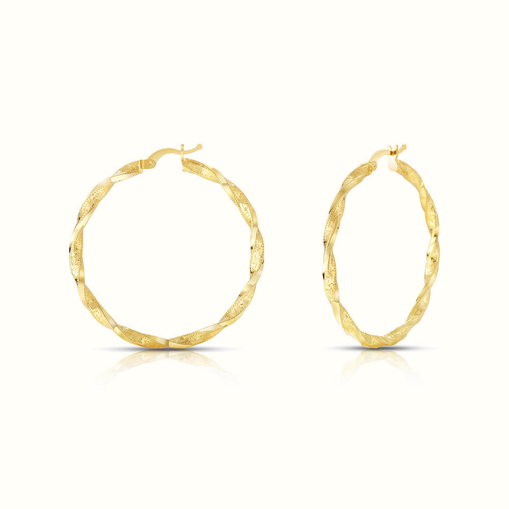 //thegoldgods.com/cdn/shop/files/womens-vermeil-waved-hoops-earrings-the-gold-goddess-womens-jewelry-by-the-gold-gods.jpg?v=1708118946