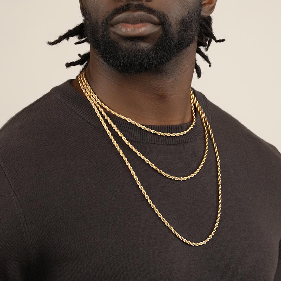 https://thegoldgods.com/cdn/shop/products/The-Gold-Gods-all-lengths-4mm-gold-plated-rope-chain-on-neck.jpg?v=1676831947&width=1214